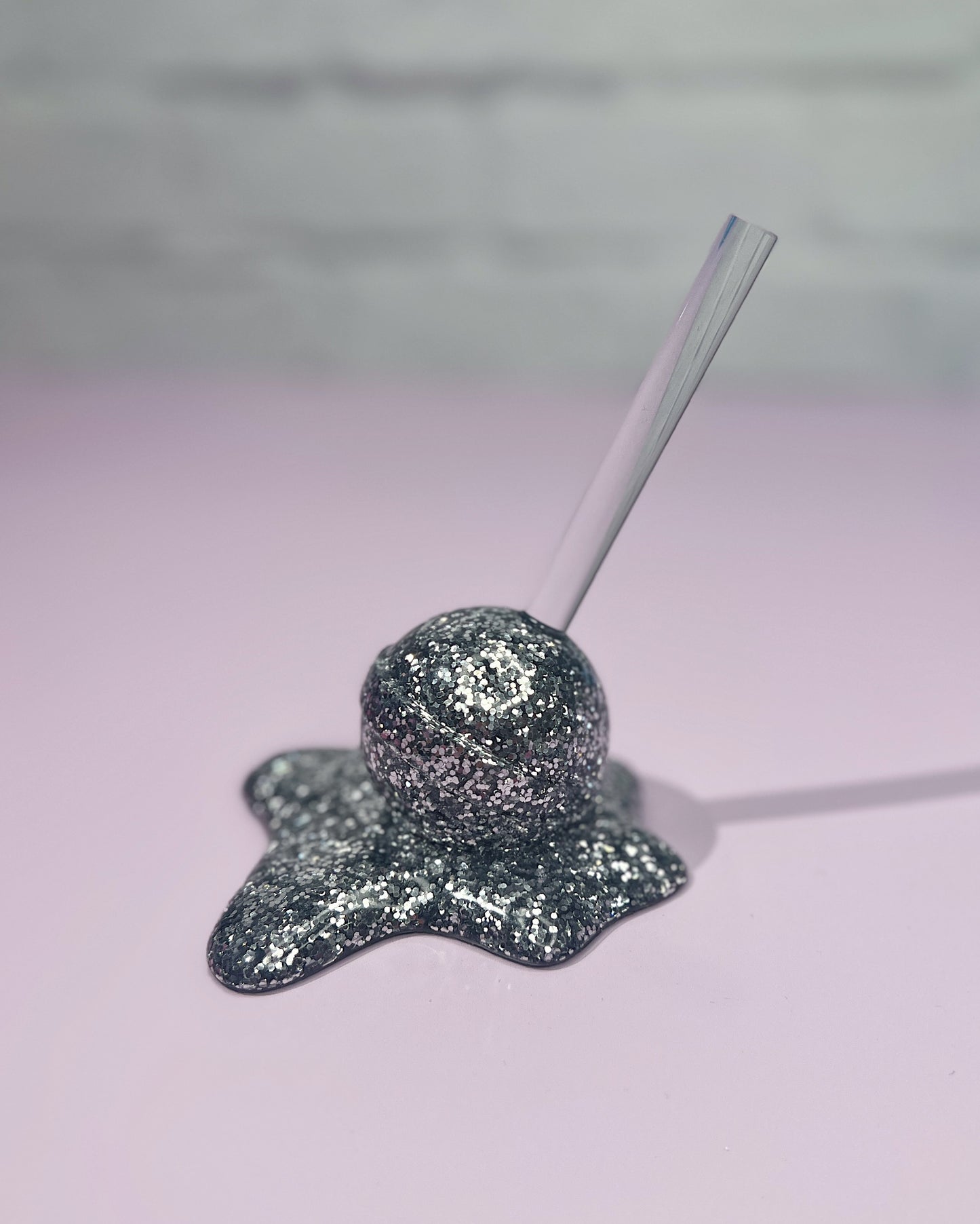 Melting Lollipop Sculpture Silver Glitter